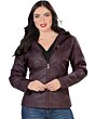 Front view of woman in Danesi 4040 Vino faux leather jacket, featuring a zip closure and classic pockets.