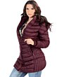 Image of a woman wearing the Danesi 4048 Burgundy Women's Quilted Jacket with Hood, showcasing the back and side profile of the jacket.