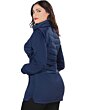 Back view of the navy quilted jacket, showing its long cut and fitted design.