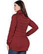 Back view of a woman wearing a burgundy long quilted jacket