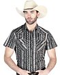 Man wearing a gray short-sleeve Western shirt with bold Aztec-inspired geometric patterns and snap-button closure, perfect for warm-weather cowboy style.