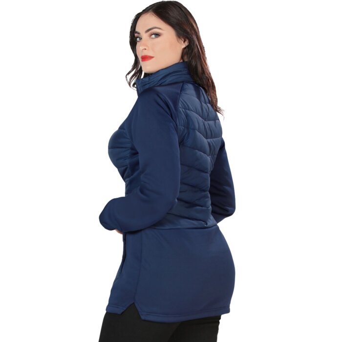 Back view of the navy quilted jacket, showing its long cut and fitted design.