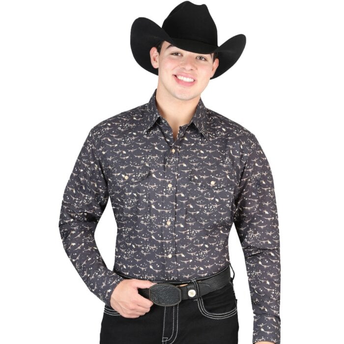 Man wearing a black Western shirt with longhorn skull print and a black cowboy hat.