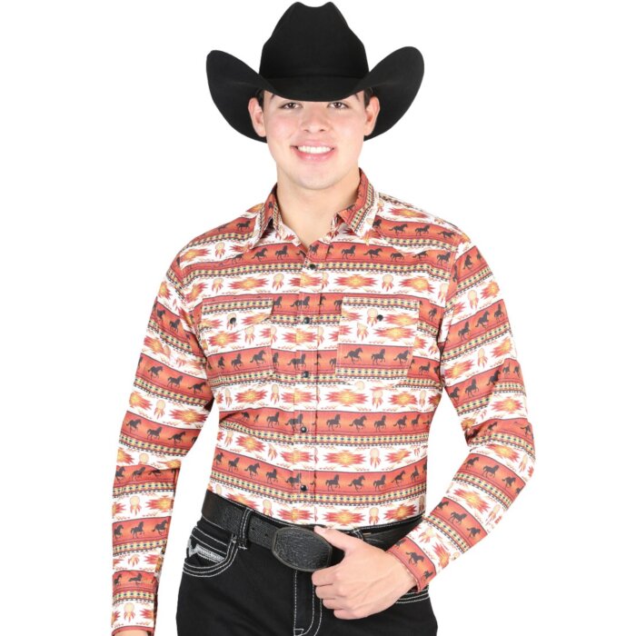 Man wearing a brick Western shirt with horse and desert patterns and a black cowboy hat.