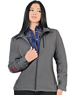 A woman wearing a gray softshell jacket with Mexico embroidery on the sleeve.