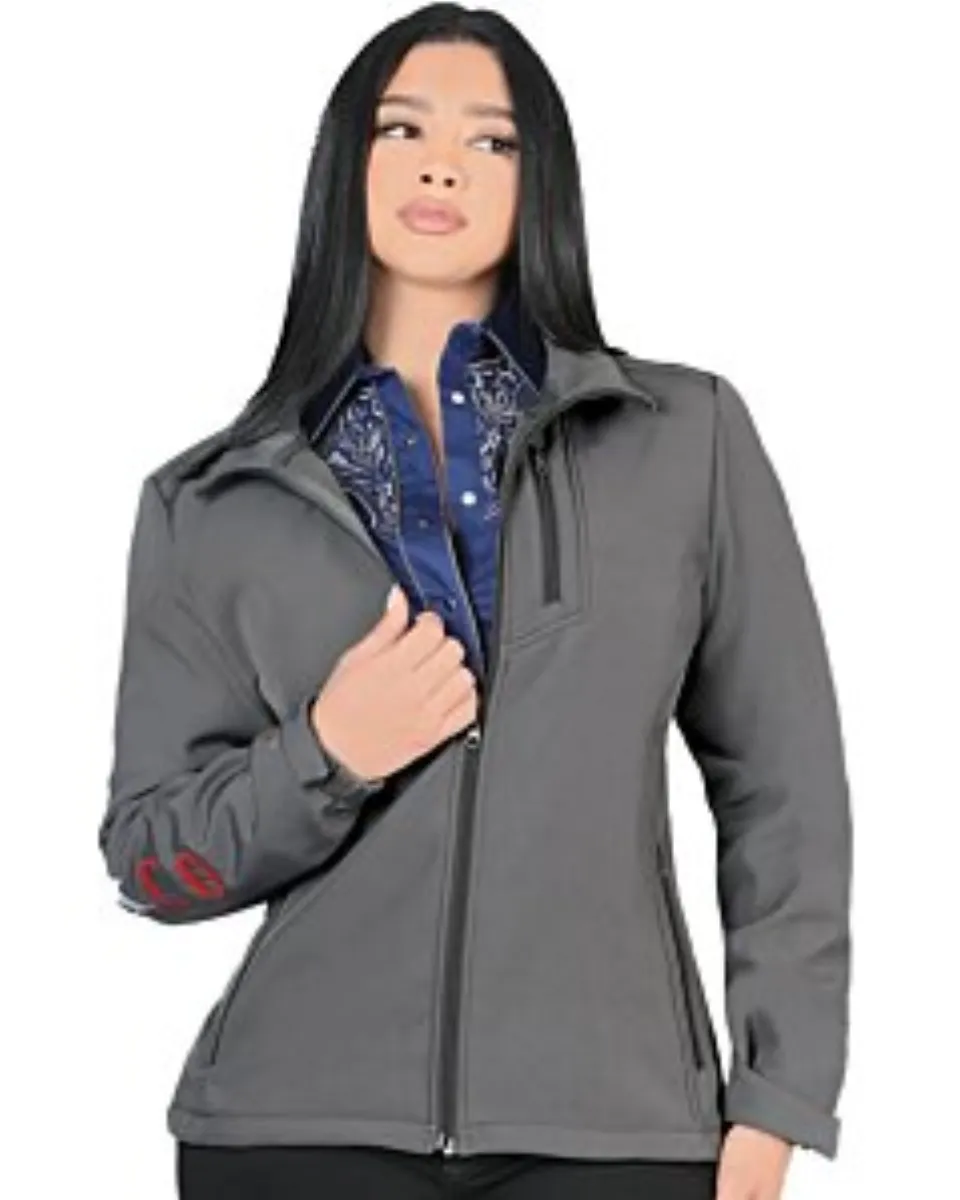 A woman wearing a gray softshell jacket with Mexico embroidery on the sleeve.