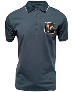 Camisa polo azul marino para caballero con un distintivo bordado de gallo, confeccionada en una mezcla transpirable de algodón y poliéster por Montero.