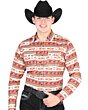 Man wearing a brick Western shirt with horse and desert patterns and a black cowboy hat.