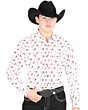 Man wearing a beige Western shirt with a bucking horse design and a black cowboy hat.