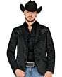 Hombre usando el saco Montero 2181 Negro-Charcoal con detalles bordados en los hombros, combinado con camisa negra y jeans para un look vaquero moderno.