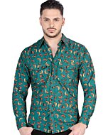 Man wearing a dark green Western shirt with a repeating cowboy boot pattern.