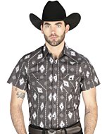 Man wearing a black short-sleeve Western shirt with an ikat-inspired geometric pattern and snap-button closure, perfect for summer cowboy style.