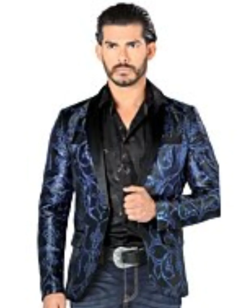 Hombre joven con barva rala luciendo saco color negro con azul rey y camisa color negra.
